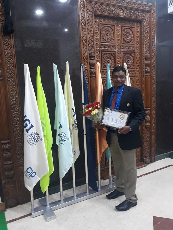 Holding Certificate of Merit for Certificate Insurance Planner course at Mangalore